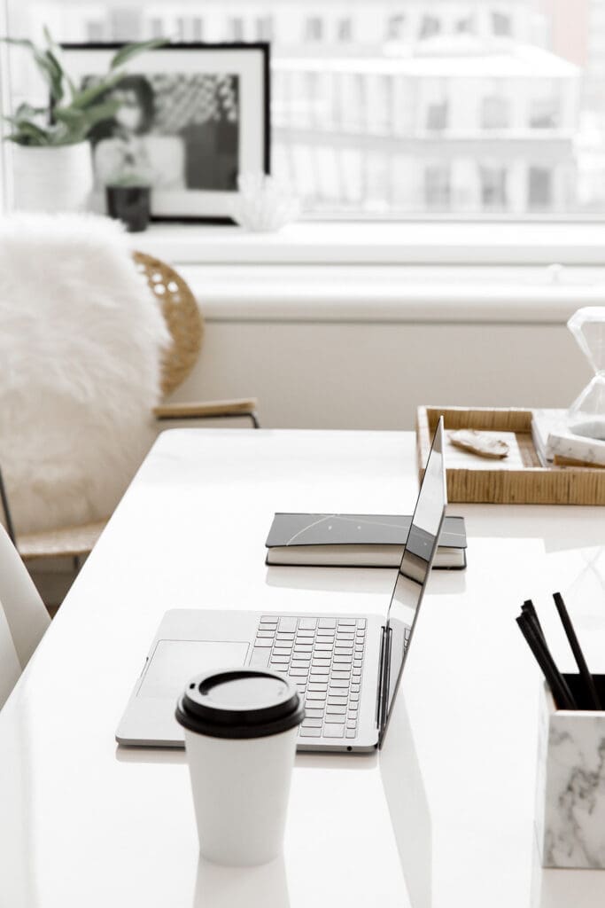 Candid creative workspace showing the process of building a website from ideas.