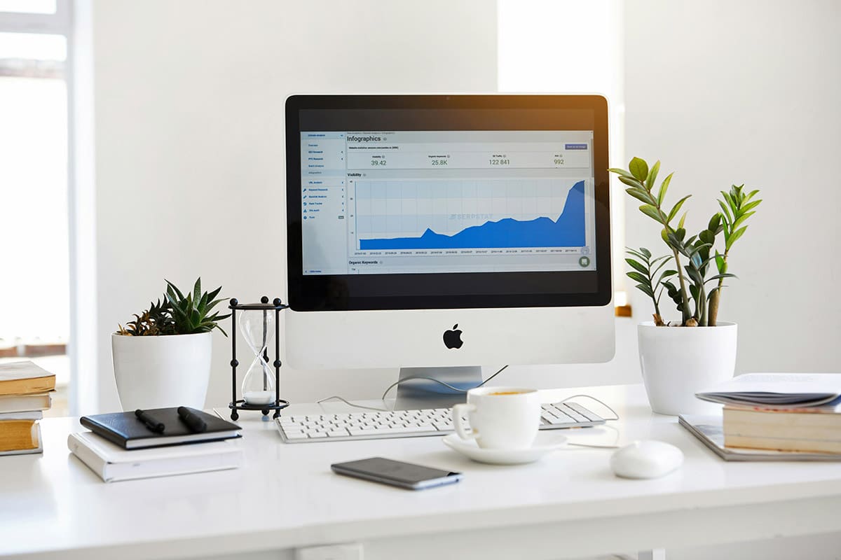 minimal workspace with analytics dashboard for branding strategy